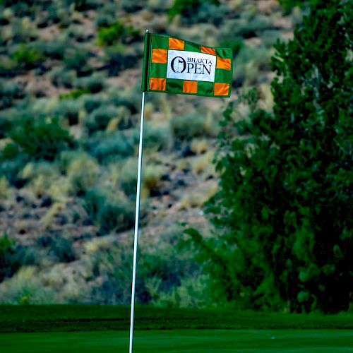 A golf flag with the word 